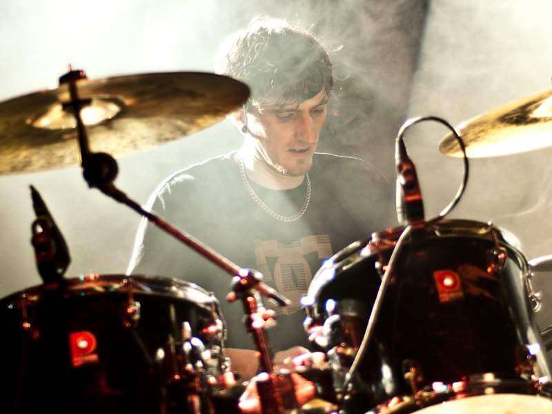 Behind the drum kit